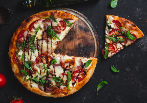 pizza-with-hamtomatoes-mozzarella-dark-background